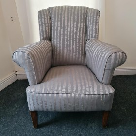 grey bucked chair